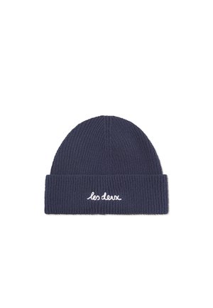 Navy blue knitted beanie with ribbed texture and a rolled cuff. Features white embroidered text "les deux" on the front.