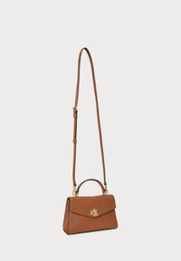 Brown leather handbag with a structured design, top handle, and adjustable shoulder strap. Features gold hardware and a geometric pattern.