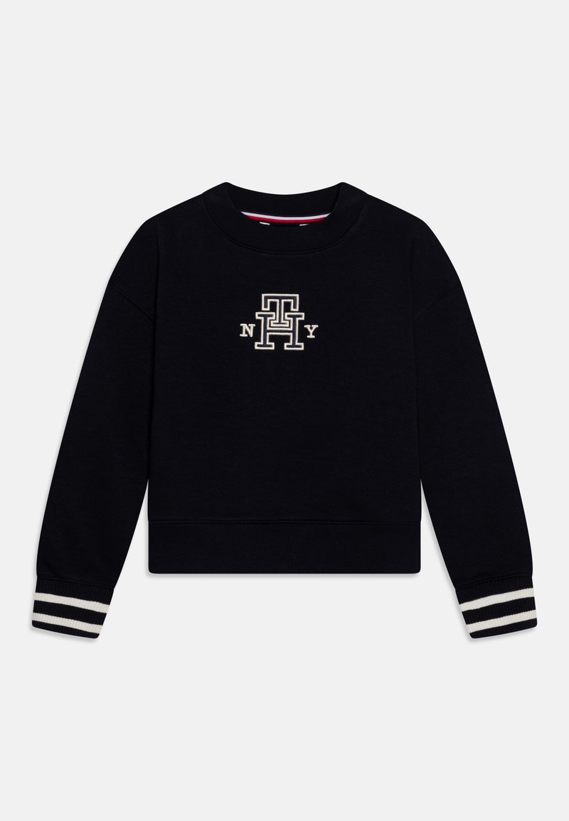 Sweat-shirt noir à manches longues avec poignets rayés blancs et logo brodé "TH NY" en crème sur la poitrine.
