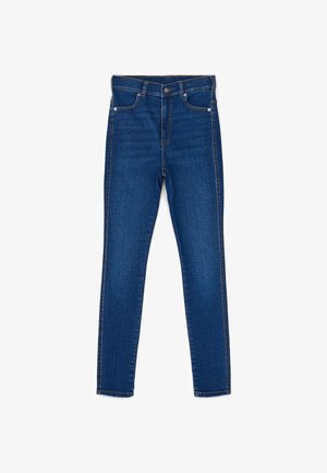 Skinny jeans in dark blue denim, featuring a classic five-pocket design, reinforced stitching, and a zip fly with a metal button closure.