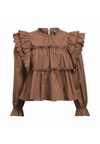 Blouse en coton marron avec manches bouffantes, volants superposés, bords festonnés et col haut. Présente une fermeture à boutons au dos.