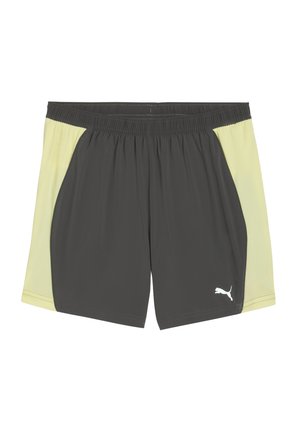 Träningsshorts med en grå kropp och gula nätpaneler på sidorna, en elastisk midja och en vit Puma-logotyp på nedre vänstra sidan.