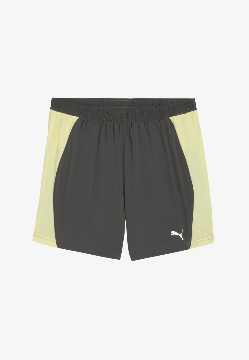 Träningsshorts med en grå kropp och gula nätpaneler på sidorna, en elastisk midja och en vit Puma-logotyp på nedre vänstra sidan.
