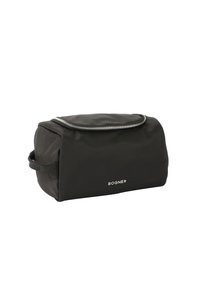 Borsa cosmetica nera realizzata in materiale morbido, con parte superiore arrotondata, chiusura con zip e manico laterale. Logo stampato in argento sulla parte anteriore.