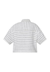 Hvid kortærmet skjorte med et ternet mønster i marineblå, med en lille krave og en lige kant. Struktureret stof med en afslappet pasform.