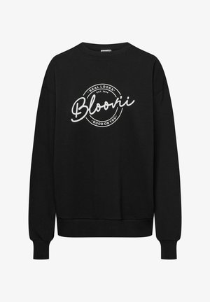 Czarna bluza z miękkiego materiału, z okrągłym dekoltem, długimi rękawami i białym wzorem graficznym z napisem z przodu.