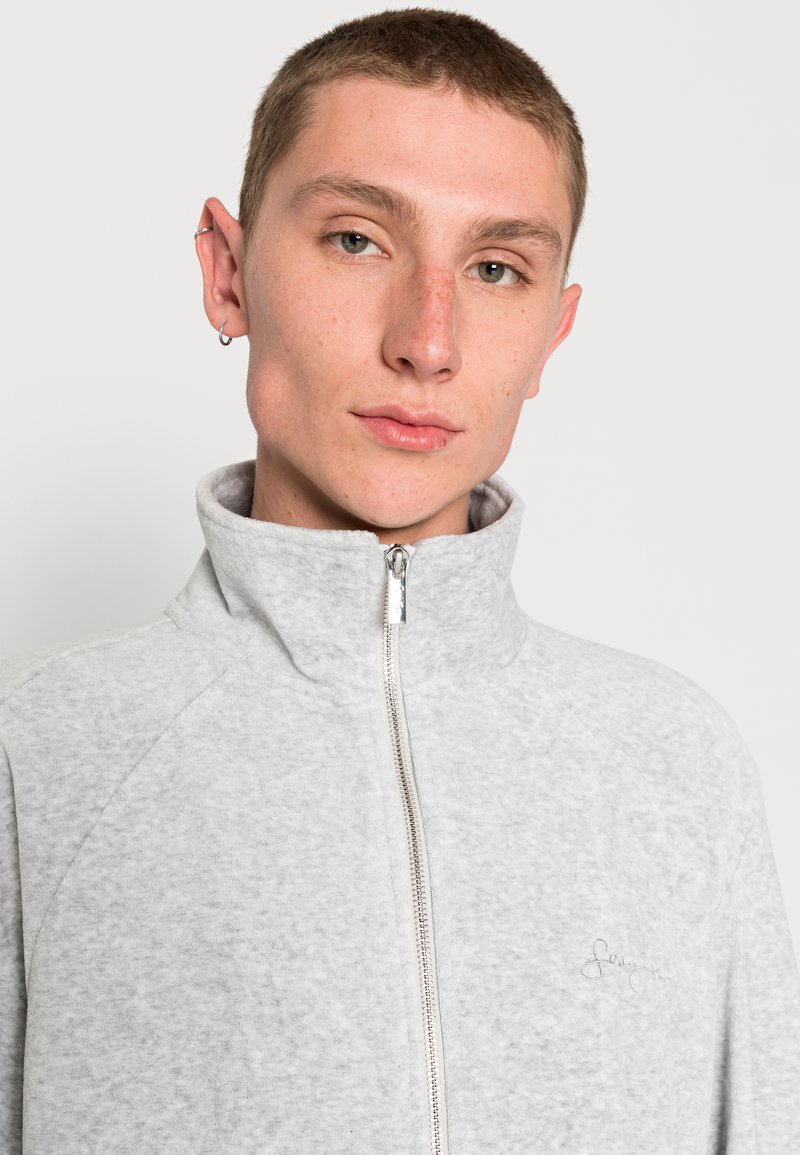 Herren Trainingsanzüge | Sean John SCRIPT LOGO ESSENTIAL VELOURS TRACKJACKET Trainingsjacke grey melange/grau-meliert - ZN09868 Herren Trainingsanzüge | Sean John SCRIPT LOGO ESSENTIAL VELOURS TRACKJACKET Trainingsjacke grey melange/grau-meliert - ZN09868
