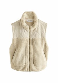 Beige vest featuring a quilted corduroy upper and soft faux fur lower. High collar and two front pockets. Zipper closure in the center.