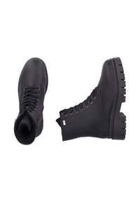 Black lace-up ankle boots made of leather with a rugged sole, featuring metal eyelets and a smooth texture. Design includes a logo accent.