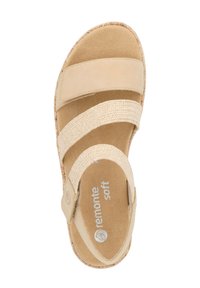 Beige sandalen met twee stoffen banden en een gevoerde binnenzool. Gelaatste bovenkant, ronde neus en geweven details op de zolen.