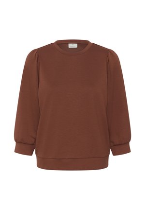 Barna, hosszú ujjú blúz puffadt ujjakkal, kerek nyakkivágással és szűk mandzsettákkal, fehér háttéren bemutatva.