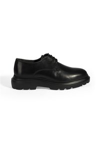 Schwarze Lederhalbschuh mit abgerundetem Zeh, sechs Schnürsenkeln und einer dicken Gummisohle mit einem Profilmuster für besseren Halt.