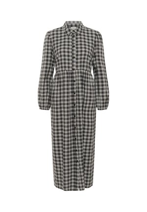 Robe longue à carreaux noir et blanc, devant boutonné, col à revers, manches longues avec poignets élastiques et taille cintrée.