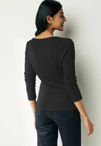 Next TWIST  FRONT - Långärmad tröja - black