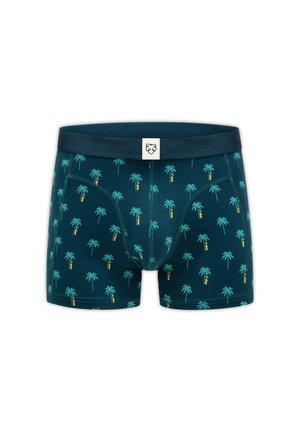 Boxer da uomo color verde petrolio scuro con motivo a palme turchesi ripetuto e vita scura con una piccola etichetta bianca con il logo di una testa di leone.