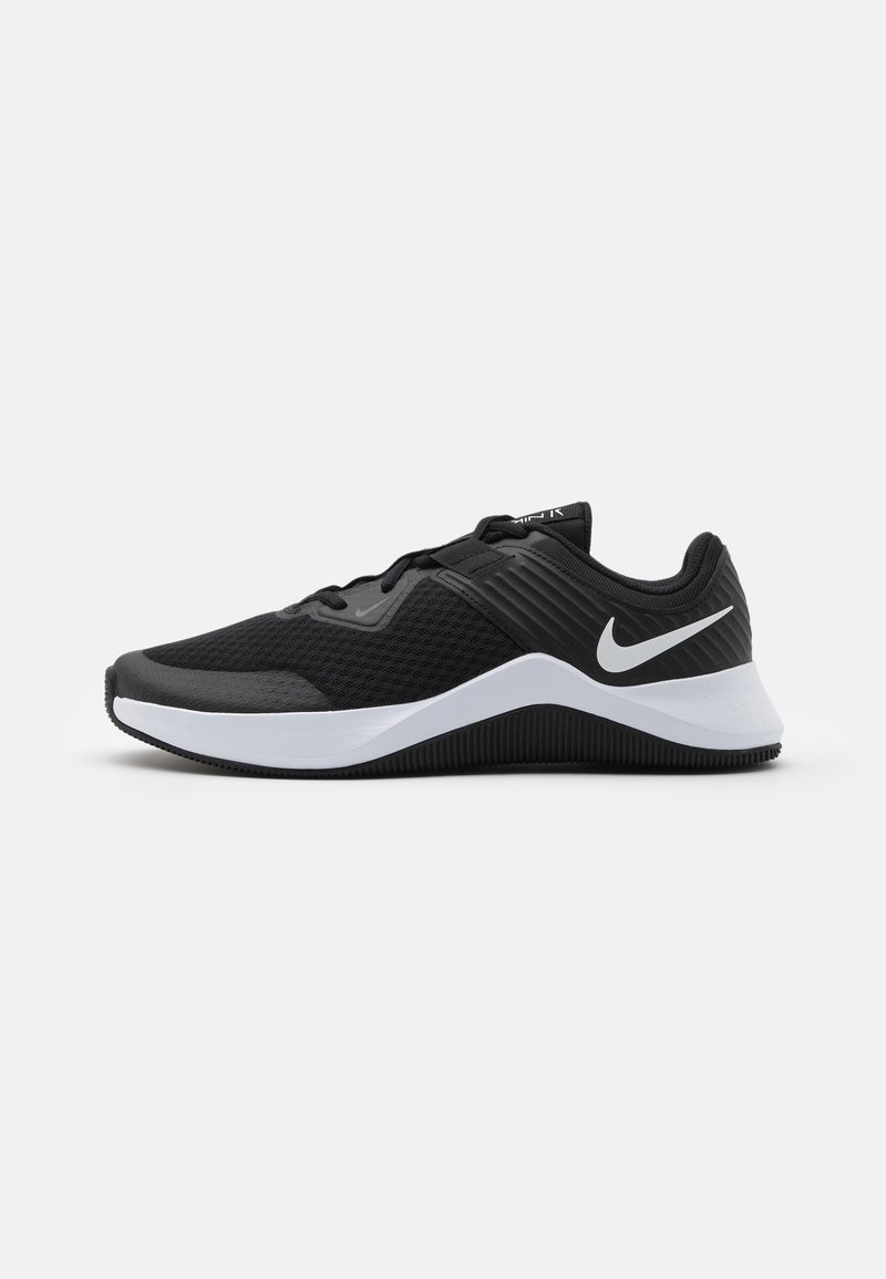 Czarno-biała Nike buty do biegania z siateczkową cholewką, białym logo Swoosh i amortyzowaną podeszwą, widziane z boku na jednolitym tle.