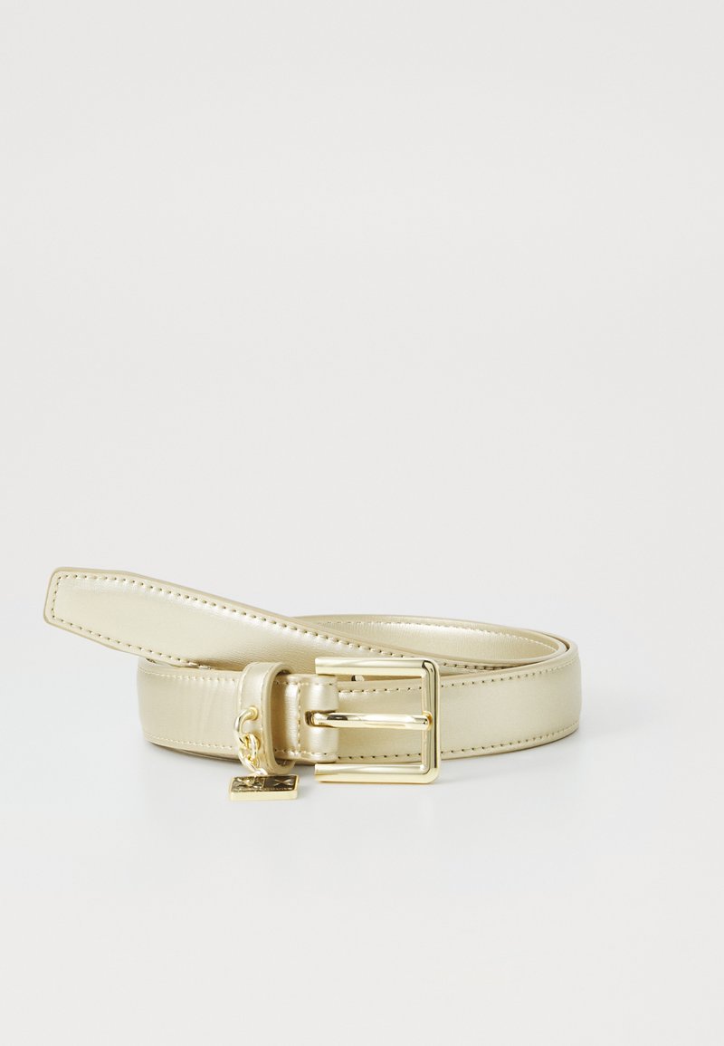 Metallic beige belt with a smooth finish, rectangular gold buckle, and a small decorative tag attached to the belt loop.