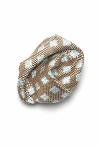 Brown patterned fabric knot with light blue floral designs. Textured finish, slightly wrinkled, rounded shape, and compact size.