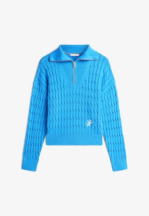 Μπλε πλεκτό πουλόβερ με γιακά με φερμουάρ, που διαθέτει διαμάντι μοτίβο και ριμπ μανσέτες και τελείωμα. Περιλαμβάνει κεντημένο λογότυπο στο μπροστινό μέρος.