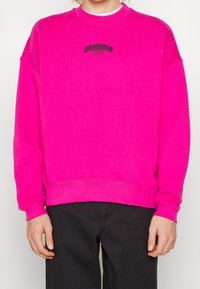 WRSTBHVR Sudadera - pink