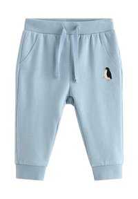 Vaaleansiniset collegehousut ribbineulottuine resoreineen, säädettävällä vyötäröllä, kahdella sivutaskulla ja pienellä brodeeratulla pingviinikoristeella.