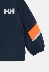 Navy jacket sleeve with elastic cuff, bright orange and reflective gray horizontal stripes, and white "HH" logo on upper arm area.