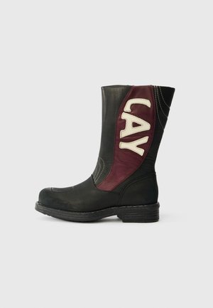 Black leather boot with burgundy leather panel featuring "LAY" in white. Square toe and medium-height heel with subtle stitching details.