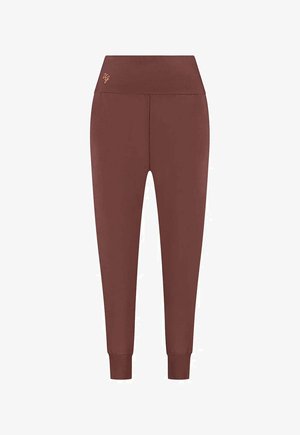 Braune Leggings mit hohem Bund, aus glattem, dehnbarem Stoff. Mit goldenem Markenlogo und enganliegenden Bündchen an den Knöcheln.
