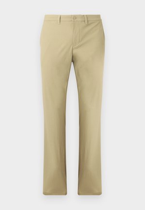 Beige broeken met een platte voorkant, knoopsluiting en rechte pijpen. Gemaakt van een gladde stof met minimale zichtbare naden.