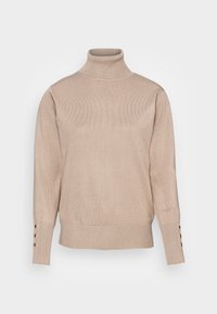 Pull à col roulé beige avec texture côtelée, manches longues et boutons décoratifs aux poignets. Tissu doux avec une coupe ajustée, idéal pour le superposition.