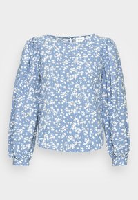 Blusa floral azul com mangas longas e volumosas, com punhos elásticos e decote redondo. Feita de um tecido leve com padrões de flores brancas.
