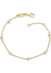 Guld kedjearmband med sex jämnt fördelade klara kristaller. Har en sköldpaddslock och justerbar längd med en oval tag.