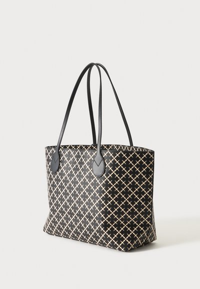 Sac cabas noir avec motif losange beige et deux longues anses noires sur fond clair.