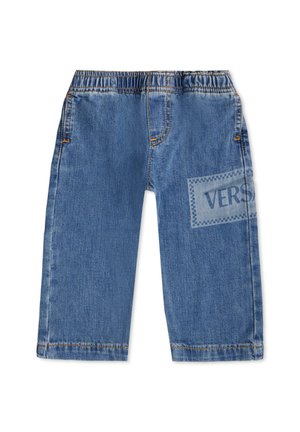 Pantalons en denim bleu avec une taille élastique, design à jambe droite, et un patch décoratif portant le mot "VERS" sur le côté.
