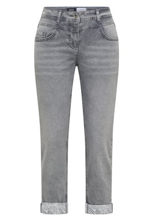 Grey denim jeans with rolled cuffs showing a white and grey leaf pattern, front button, zipper, and five-pocket design.