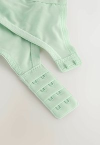 Închidere cu cârlig și ochi de lenjerie verde deschis, cu patru rânduri de cârlige și trei coloane, pe un fundal neutru.