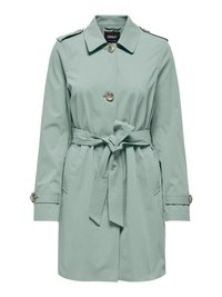 Trench-coat vert menthe avec une taille ceinturée, une fermeture à boutons et des épaulettes. Comprend des manches longues et deux poches latérales.