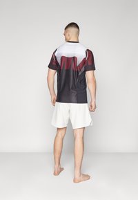 Venum RAPID FIGHTSHORTS - Sport rövidnadrágok - white/black