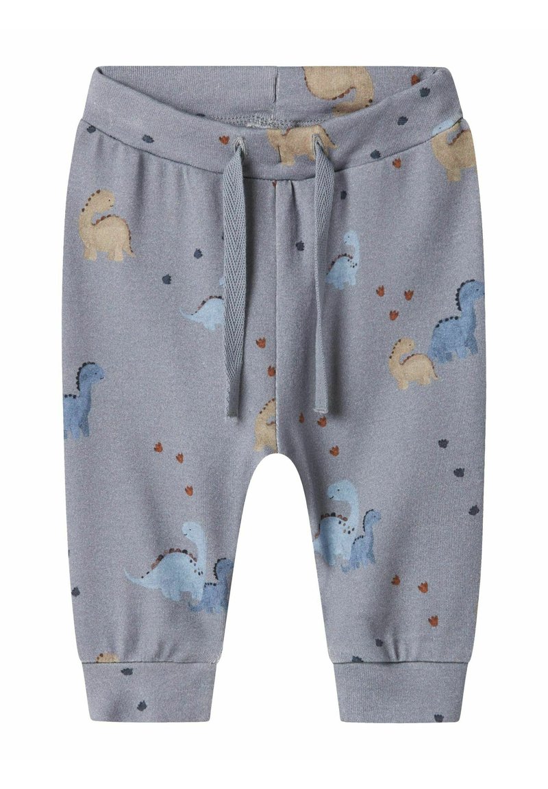 Graue Baumwoll-Jogginghosen mit elastischem Bund, die mit bunten Dinosauriermustern und kleinen Herzmotiven versehen sind. Enganliegende Bündchen an den Knöcheln.