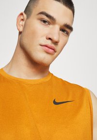 Nike Performance DRY TANK - Top - mantra orange/kumquat/heather/black
