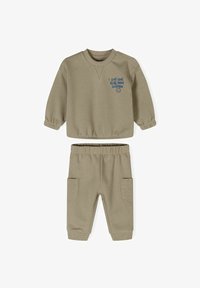 Valgt, beige