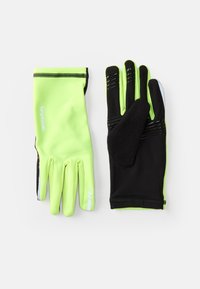 Gants de cyclisme noirs et verts fluo, dotés d'une texture de prise, de poignets élastiques et d'accents réfléchissants pour une meilleure visibilité. Le gant gauche a une finition lisse.