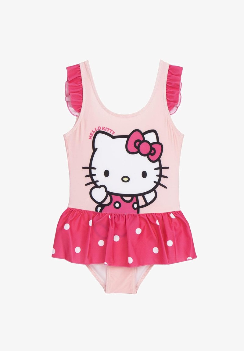 Maillot de bain Hello Kitty avec un corps rose, des bretelles froncées roses et une jupe évasée à pois blancs. Motif frontal de Hello Kitty.