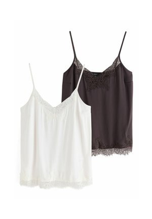 Two lace-trimmed camisole tops in black and white with thin shoulder straps, displayed flat on a white background.