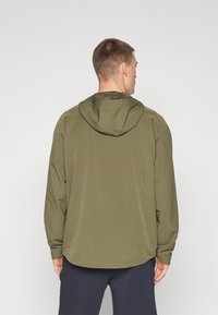 Under Armour UNSTOPPABLE JACKET - Outdoorová bunda - marine/green/black