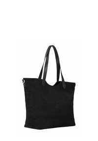 Sac cabas noir en tissu texturé avec des anses en cuir lisse. Présente une forme simple et structurée avec des accents matériels minimaux.