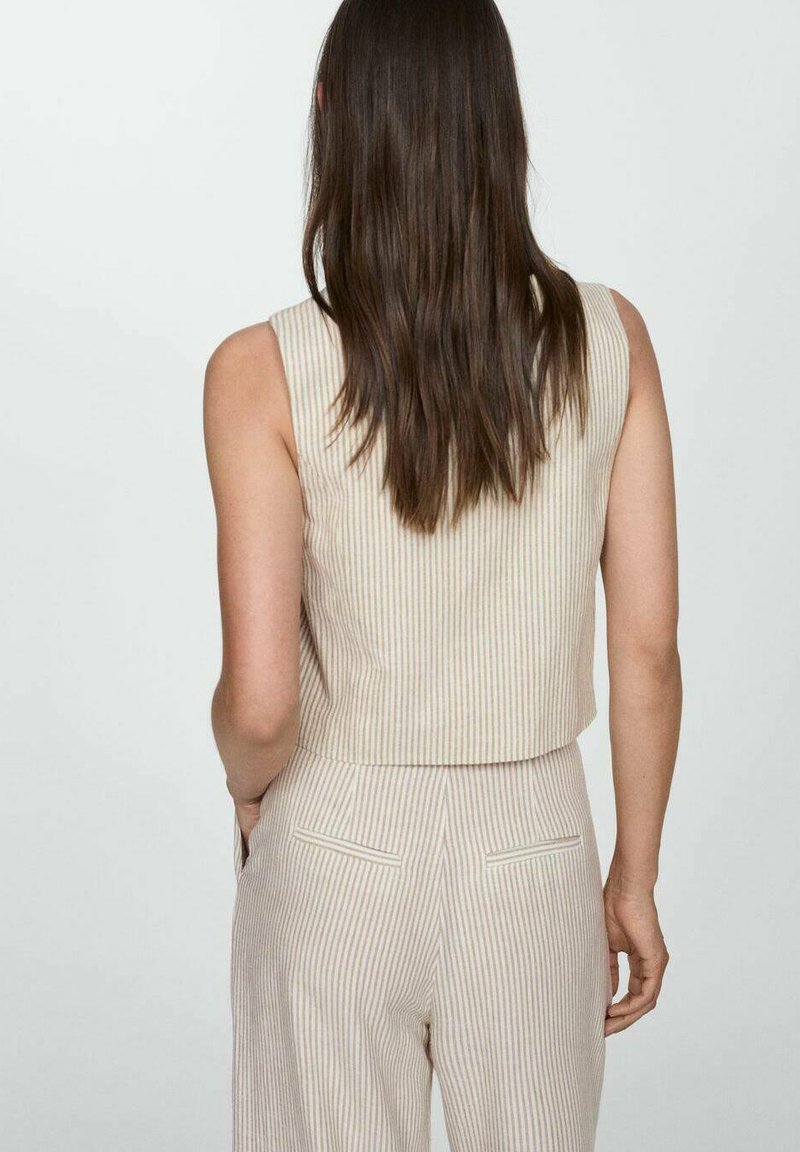 Mango Chaleco off-white/crema