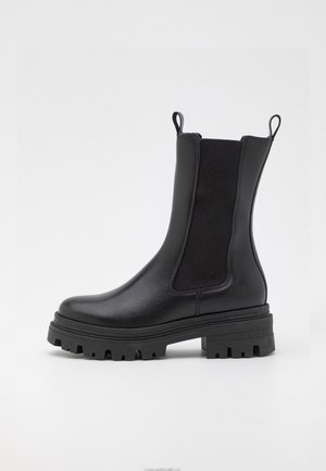 Botas con plataforma - black