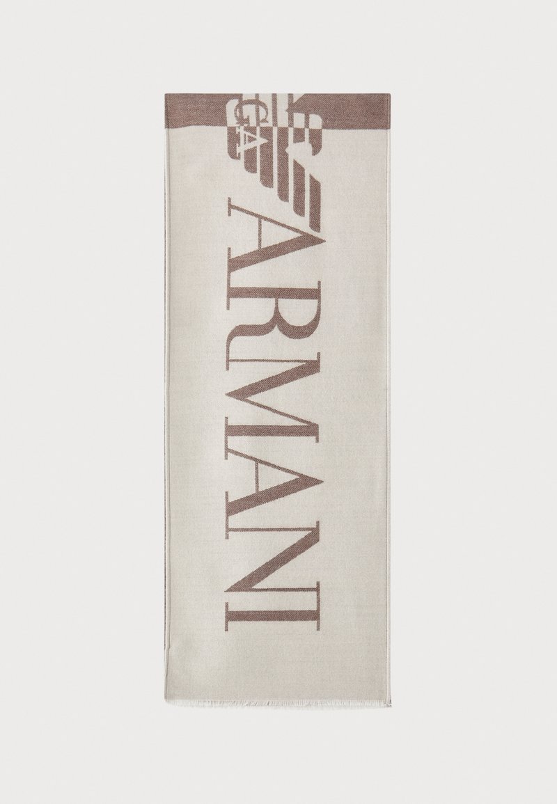Écharpe beige avec le logo "ARMANI" en marron. Forme rectangulaire avec une texture douce et des bords frangés. Design minimaliste, matériau de haute qualité.