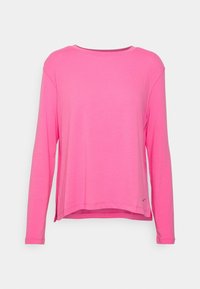 Långärmad topp i klargul, tillverkad av mjukt tyg. Har rundad halsringning, avslappnad passform och en något längre bakkant.